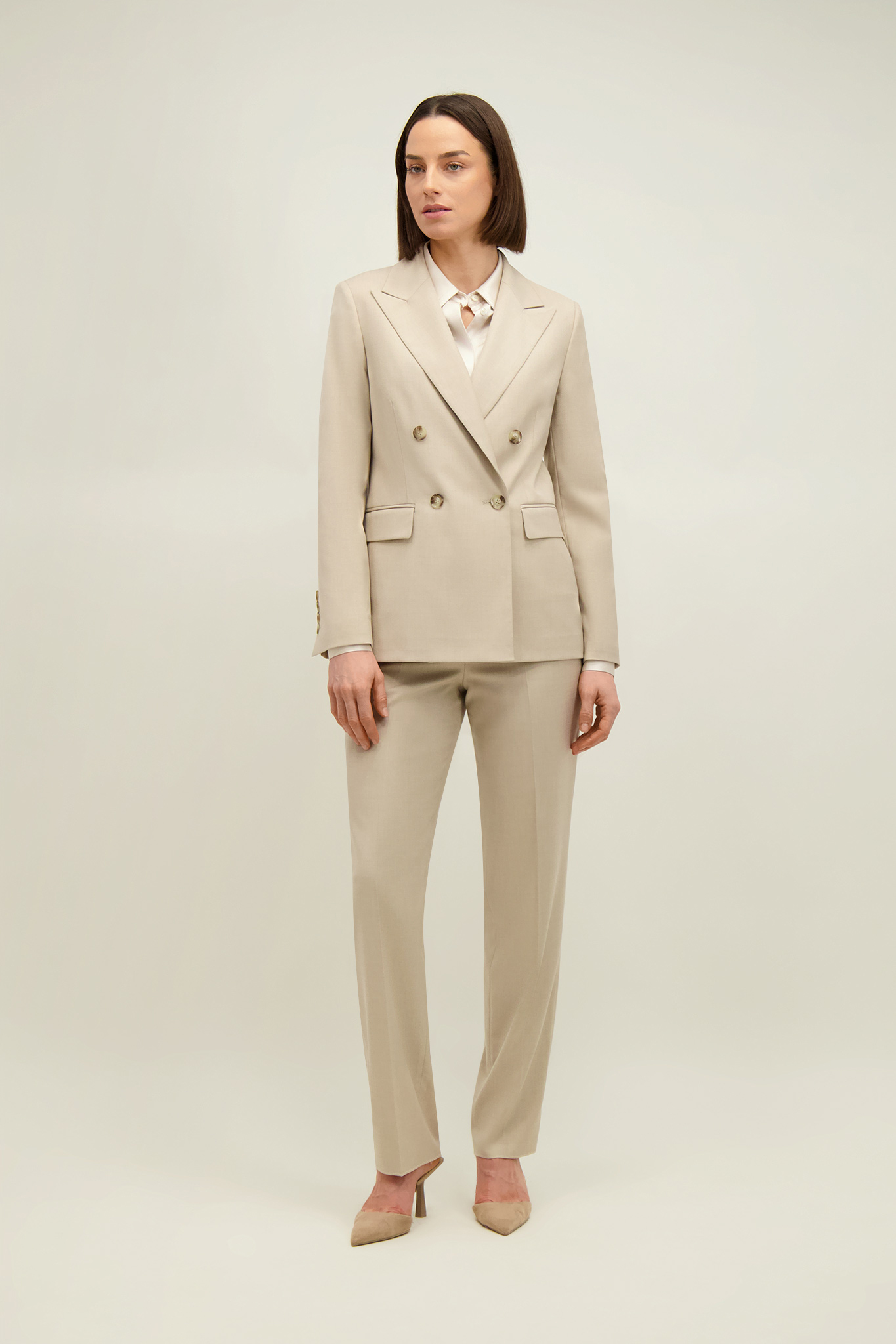 Beżowe spodnie damskie 87594